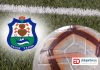 Imagen de un balón de fútbol y a su izquierda el escudo de el Unión Tejina.
