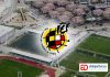 Imagen de la Ciudad Deportiva Las Rozas y en frente el escudo de la Federación Española de Fútbol.