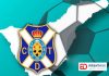 Escudo del CD Tenerife frente a la imagen de la misma isla.